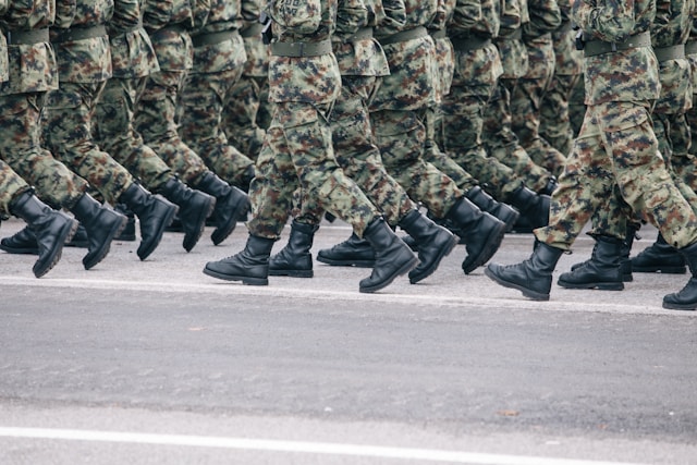 soldiers in camouflage marching